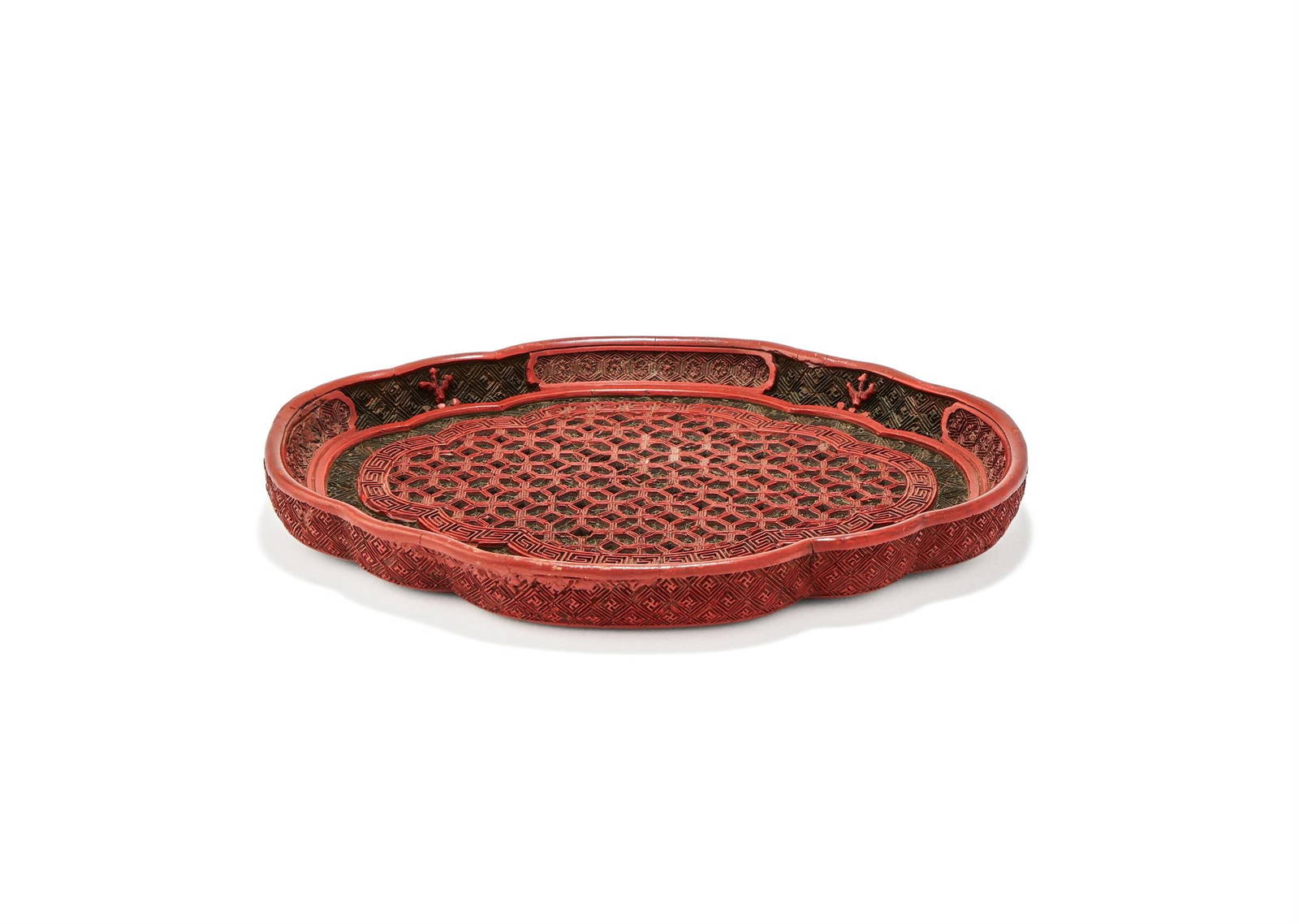 A Chinese cinnabar lacquer quatrelobed tray