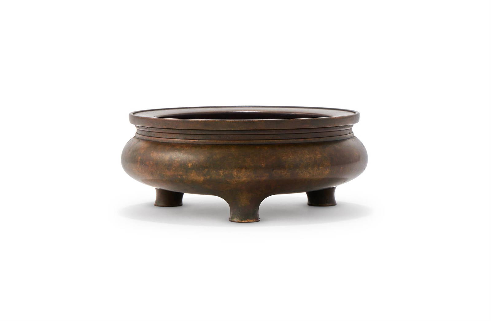 A Chinese bronze tripod censer