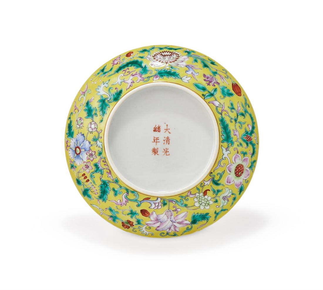 A Chinese Famille Rose yellow-ground dish