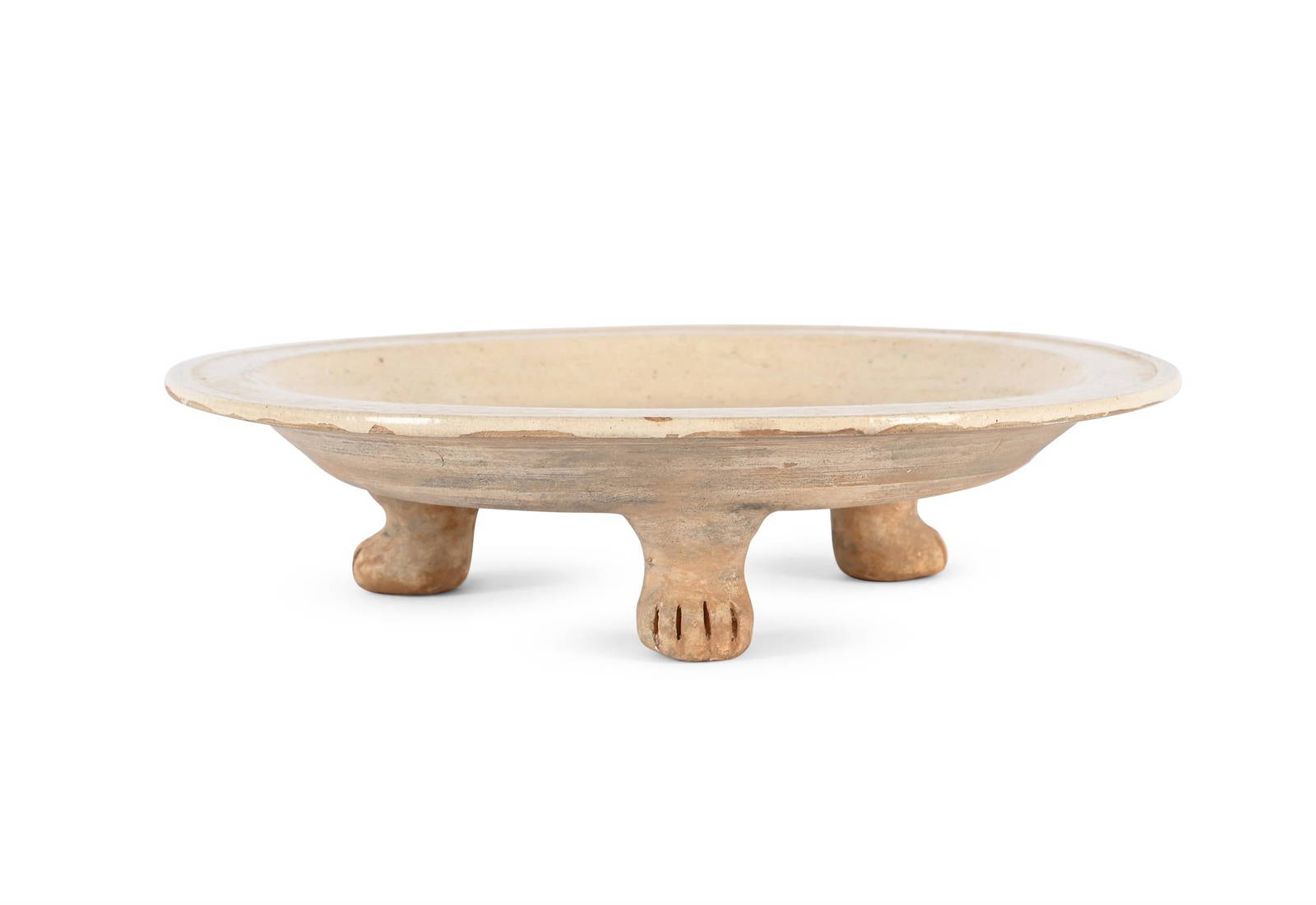 A Chinese white glazed tripod earthenware dish