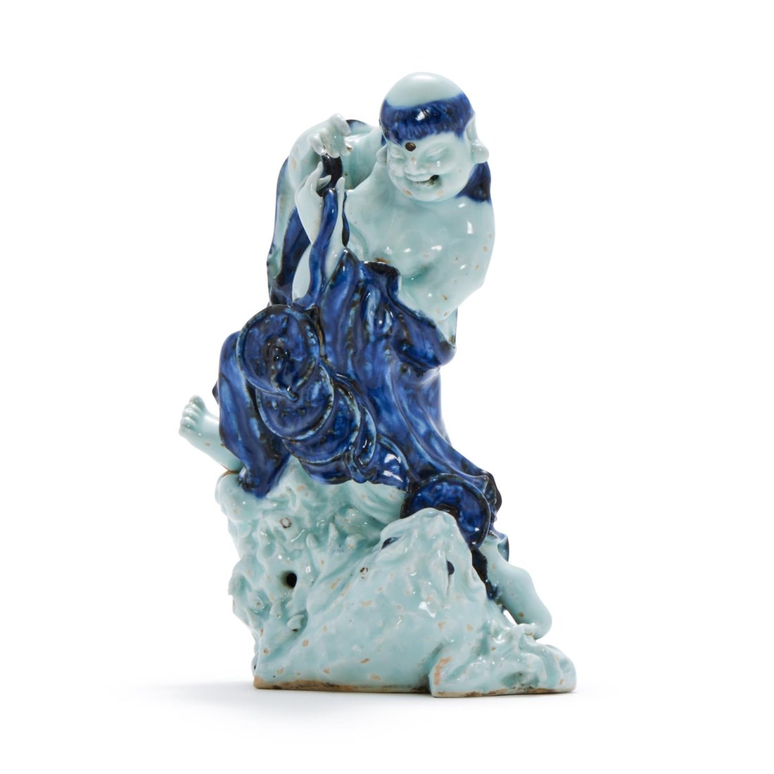 A rare Chinese blue and white porcelain figure of Liuhai