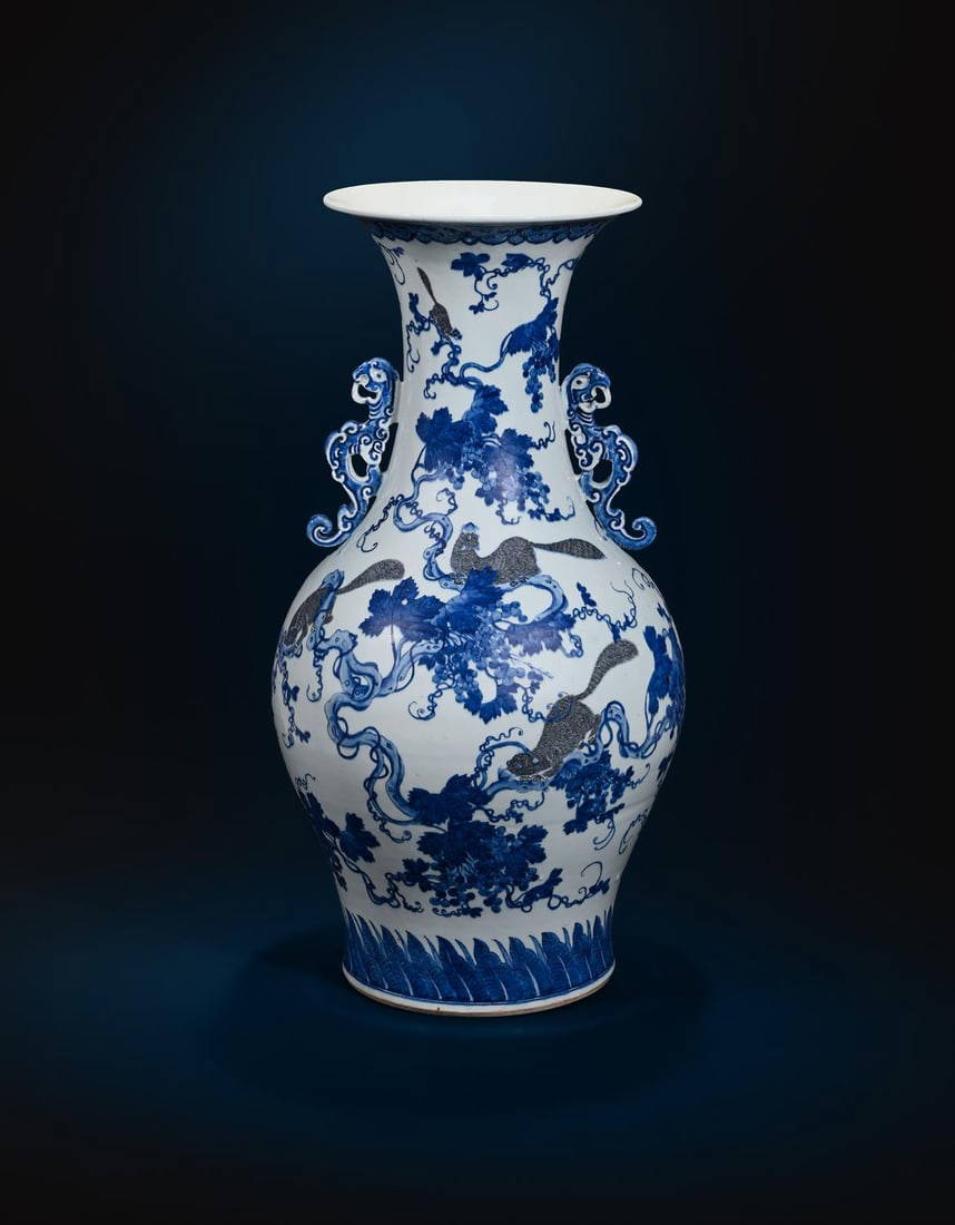 A large Chinese underglaze blue and copper red twin handled vase