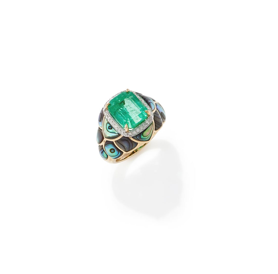 Y AN EMERALD, DIAMOND AND ABALONE SHELL RING: Y AN EMERALD, DIAMOND AND ABALONE SHELL RINGThe rectangular step cut emerald with canted corners, weighing 5.38 carats, within a brilliant cut diamond frame, to a tapered surround set with abalone she