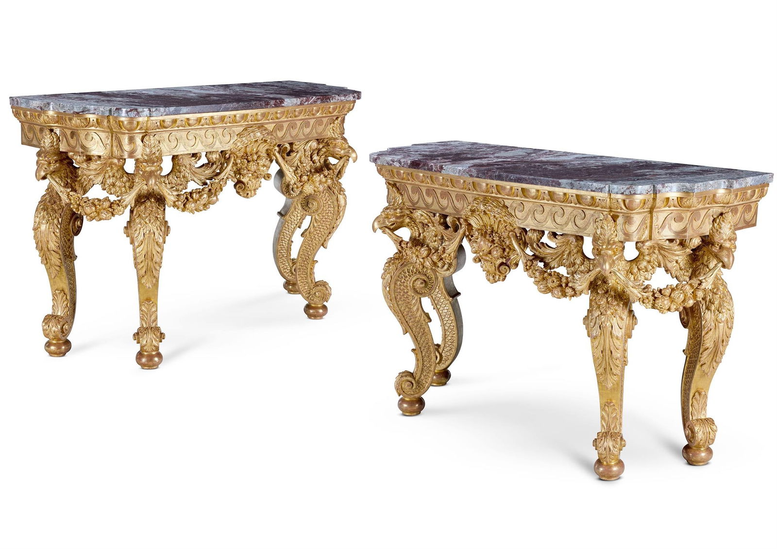 ‡ A PAIR OF GILTWOOD SIDE TABLES, CIRCA 1900: ‡ A PAIR OF GILTWOOD SIDE TABLES IN THE MANNER OF WILLIAM KENT, CIRCA 1900Each with a modern red and grey mottled marble top above a foliate egg and dart and Vitruvian scroll frieze, hung with swags
