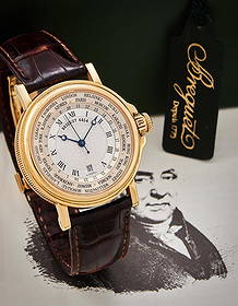 Y BREGUET, MARINE HORA MUNDI, REF. 3700, AN 18 CARAT GOLD WORLD TIME WRISTWATCH WITH DATE: Y BREGUET, MARINE HORA MUNDI, REF. 3700AN 18 CARAT GOLD WORLD TIME WRISTWATCH WITH DATE, NO. 4454H, CIRCA 2000Movement: Cal. 563, automatic, 25 jewels Case: 18 carat gold case, screwed down case back