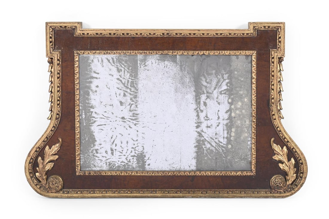 A GEORGE II WALNUT AND PARCEL GILT OVERMANTEL WALL MIRROR, IN THE MANNER OF WILLIAM KENT, CIRCA 1750: A GEORGE II WALNUT AND PARCEL GILT OVERMANTEL WALL MIRROR