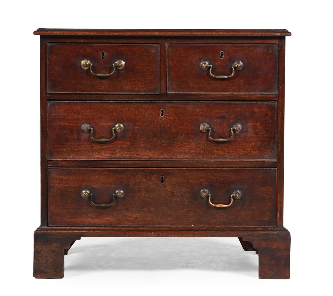 A GEORGE III MAHOGANY CHEST OF DRAWERS, IN THE MANNER OF THOMAS CHIPPENDALE, CIRCA 1770: A GEORGE III MAHOGANY CHEST OF DRAWERSIN THE MANNER OF THOMAS CHIPPENDALE, CIRCA 1770With 'S' shaped escutcheons, the chest overall of compact proportions74cm high, 76cm wide, 48cm deep overall