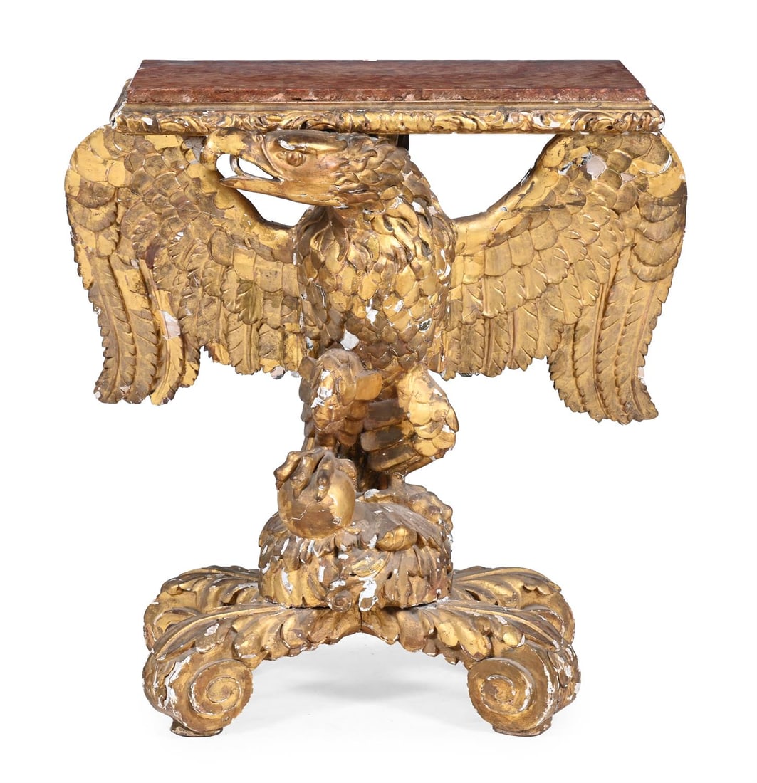A CARVED GILTWOOD AND ROUGE GRIOTTE CONSOLE TABLE, MID 18TH CENTURY AND LATER: A CARVED GILTWOOD AND ROUGE GRIOTTE CONSOLE TABLEIN THE MANNER OF WILLIAM KENT, MID 18TH CENTURY AND LATER 84cm high, 78cm wide, 48cm deepFor a console table closely comparable in design - most notabl
