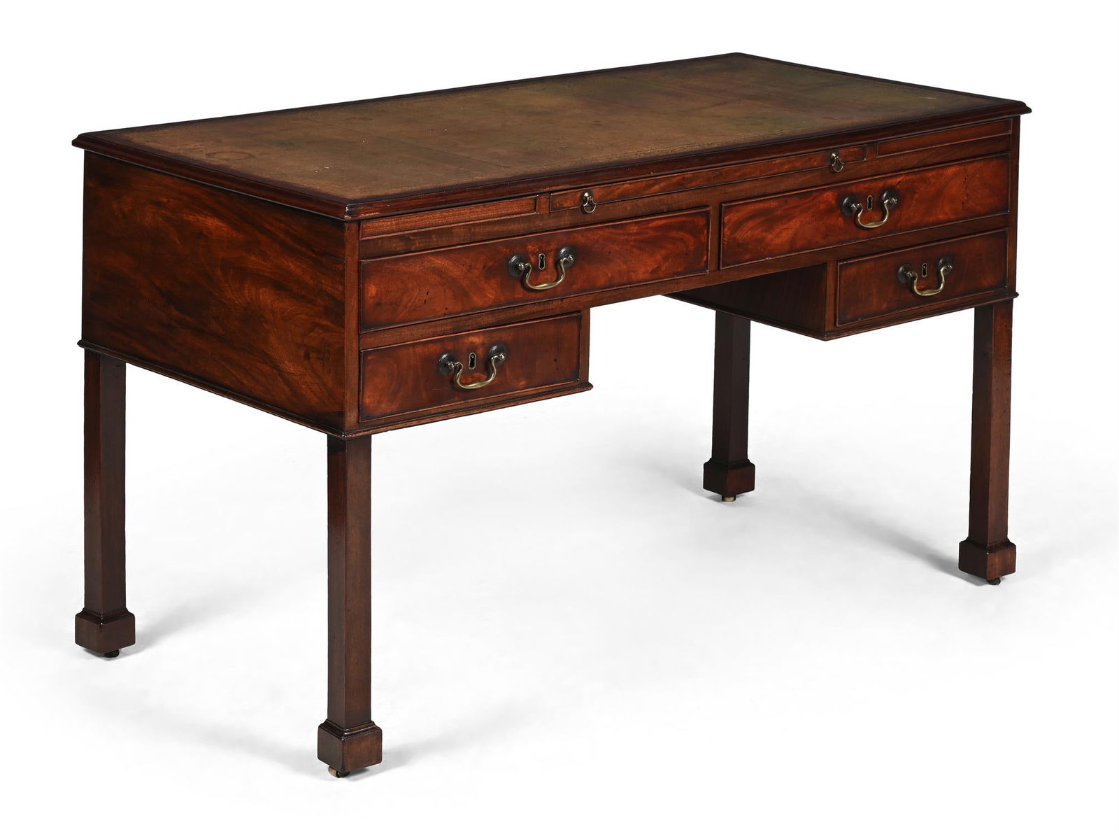 A GEORGE III MAHOGANY AND GILT TOOLED LEATHER INSET PARTNER'S DESK, CIRCA 1780: A GEORGE III MAHOGANY AND GILT TOOLED LEATHER INSET PARTNER'S DESK IN THE MANNER OF THOMAS CHIPPENDALE, CIRCA 1780With a gilt tooled inset leather slide and false drawers to one side 78cm high, 132cm