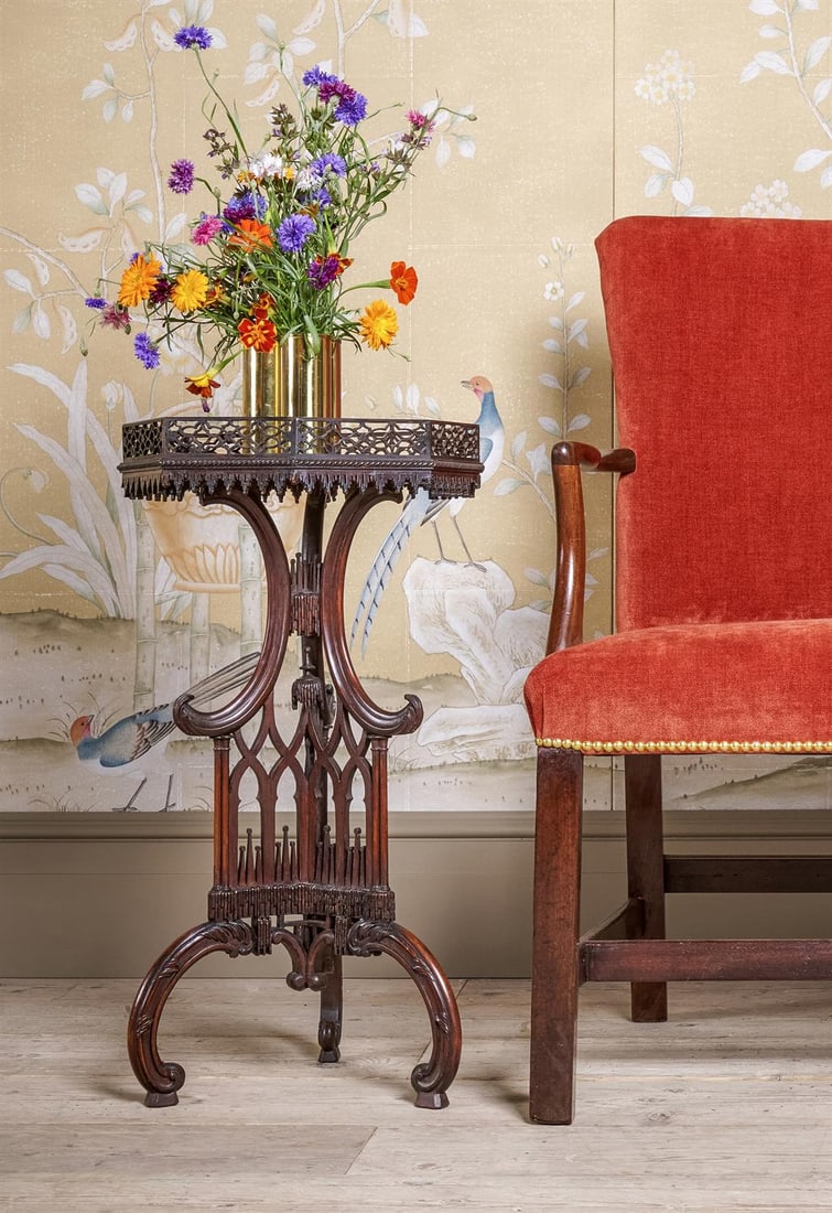 A CARVED AND PIERCED MAHOGANY CANDLE STAND OR OCCASIONAL TABLE: A CARVED AND PIERCED MAHOGANY CANDLE STAND OR OCCASIONAL TABLEIN THE MANNER OF THOMAS CHIPPENDALE, 19TH CENTURY INCORPORATING SOME PERIOD ELEMENTSWith a slide69.5cm high, the octagonal top 37 x 36cmPr