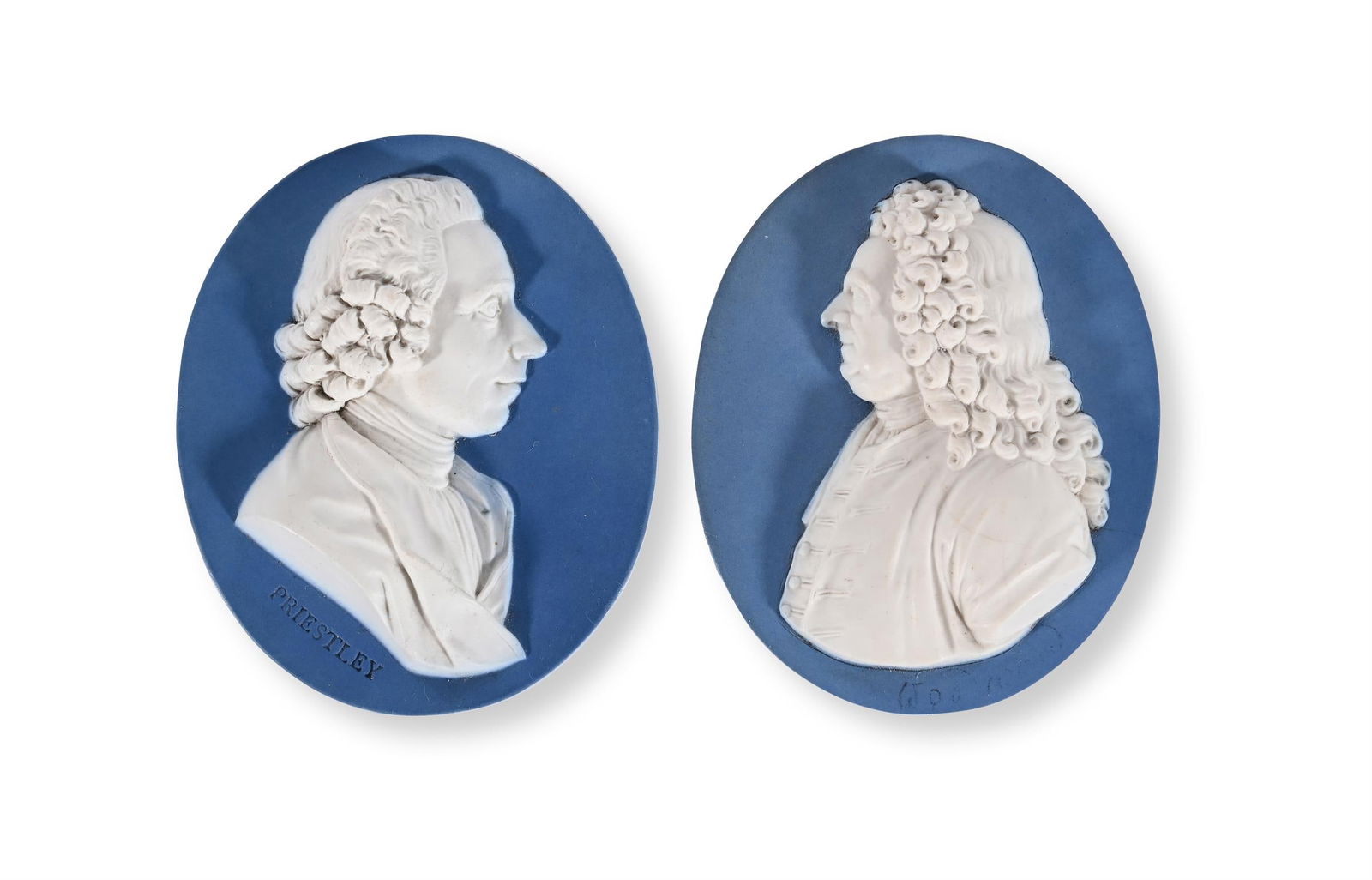 TWO WEDGWOOD & BENTLEY SOLID PALE-BLUE JASPER OVAL TITLED PORTRAIT PLAQUE: A WEDGWOOD & BENTLEY SOLID PALE-BLUE JASPER OVAL TITLED PORTRAIT PLAQUE OF THE CHEMIST AND UNITARIAN DISSENTER JOSEPH PRIESTLEY FRS (1733-1804) AND ANOTHER OF THE NATURALIST DR JOHN WOODWARD (1665-172