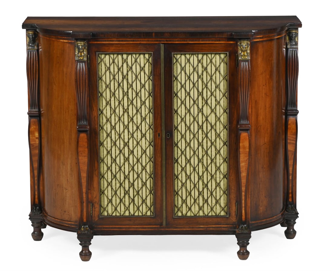 Y A GEORGE III ROSEWOOD, SATINWOOD AND BRASS MOUNTED SIDE CABINET, CIRCA 1810: Y A GEORGE III ROSEWOOD, SATINWOOD AND BRASS MOUNTED SIDE CABINETIN THE MANNER OF THOMAS CHIPPENDALE THE YOUNGER, CIRCA 181087cm high, 108.5cm wide, 52cm deepThe resurgence of interest in the Egyptian