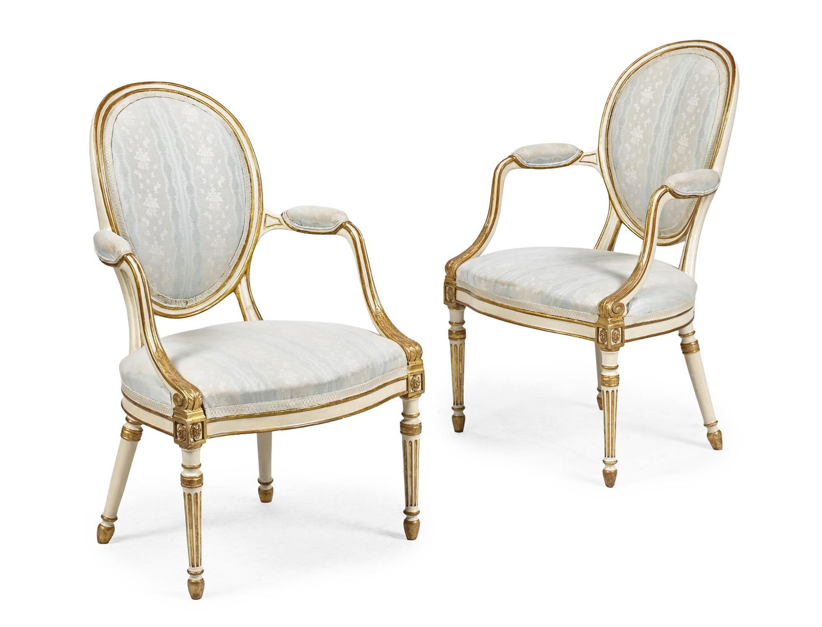 A PAIR OF GEORGE III CREAM PAINTED AND PARCEL GILT ARMCHAIRS, CIRCA 1790: A PAIR OF GEORGE III CREAM PAINTED AND PARCEL GILT ARMCHAIRSIN THE MANNER OF THOMAS CHIPPENDALE THE YOUNGER, CIRCA 1790 95.5cm high, 62cm wide, 50cm deep