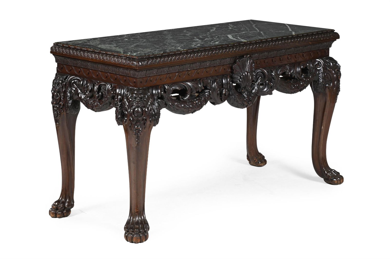 A CARVED WALNUT AND SERPENTINE MARBLE TOPPED SIDE OR CONSOLE TABLE, LATE 19TH TO EARLY 20TH CENTURY: A CARVED WALNUT AND SERPENTINE MARBLE TOPPED SIDE OR CONSOLE TABLEIN GEORGE II STYLE, LATE 19TH TO EARLY 20TH CENTURYWith three concealed drawers to the reverse 85.5cm high, 153cm wide, 61cm deep