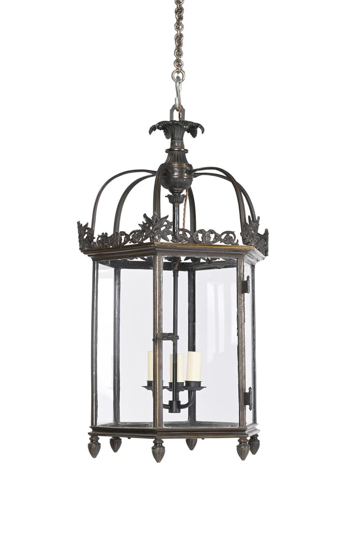 A GEORGE IV PARCEL GILT BRONZE HEXAGONAL LANTERN, CIRCA 1825: A GEORGE IV PARCEL GILT BRONZE HEXAGONAL LANTERN CIRCA 1825Crisp upper cresting above later fitted electrical fitment within glazed sides and door 71cm high, 37cm wide