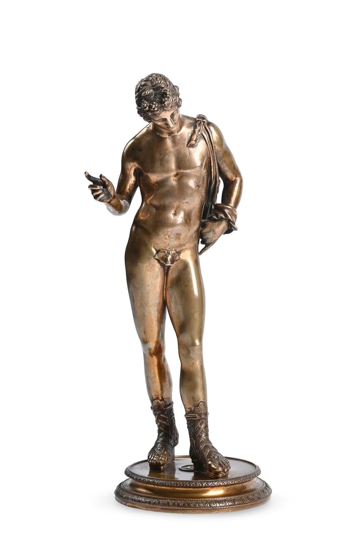 AFTER THE ANTIQUE, A GILT BRONZE BRASS FIGURE OF NARCISSUS, BY BENEDETTO BOSCHETTI, ROME, 1820-50: AFTER THE ANTIQUE, A GILT BRONZE BRASS FIGURE OF NARCISSUSBY BENEDETTO BOSCHETTI, ROME, 1820-50 Inscribed to base B Boschetti Roma38.9cm high, the base 14.5cm diameterBenedetto Boschetti exhibited at