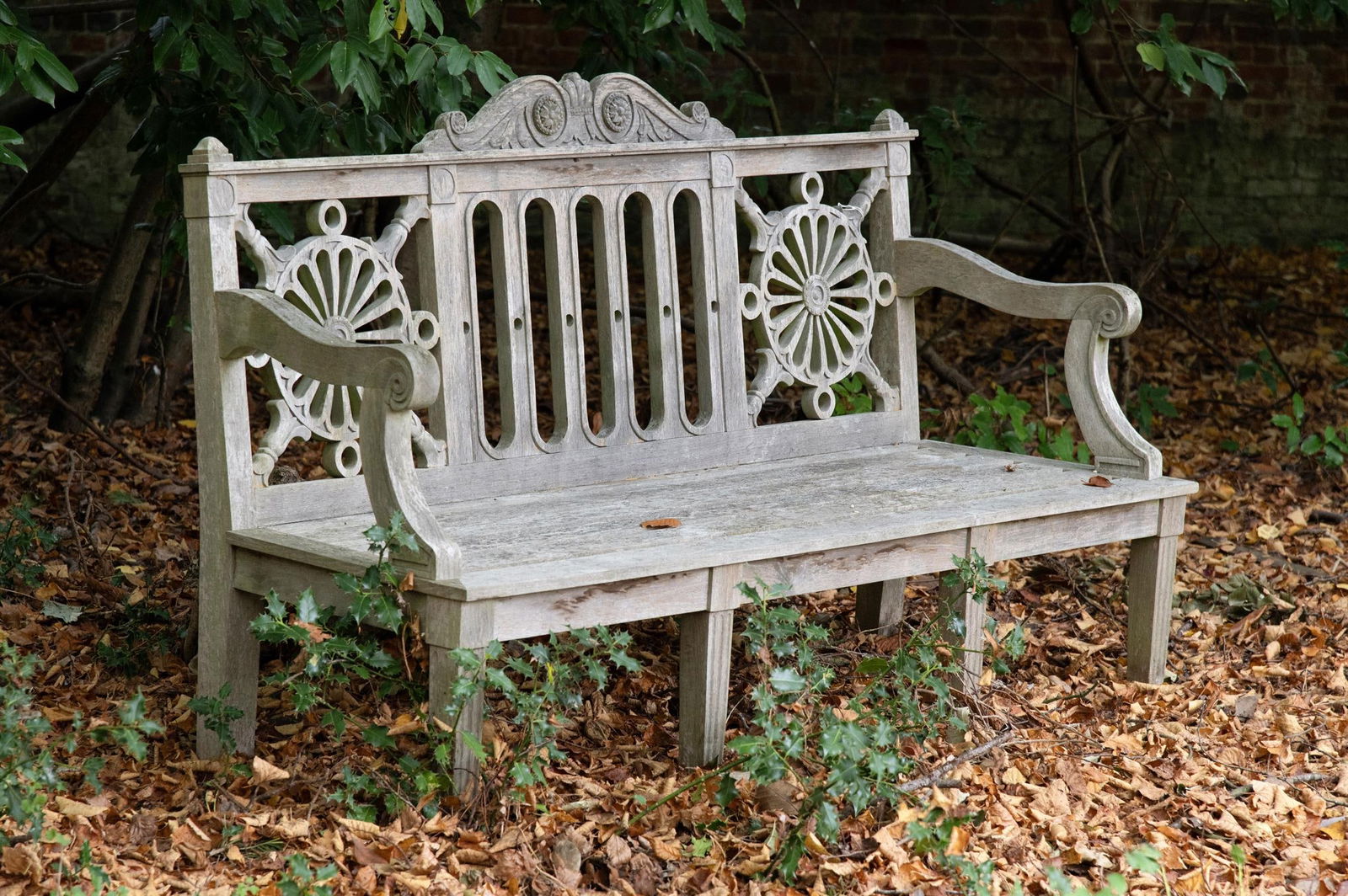 A CARVED HARDWOOD 'HAREWOOD' BENCH, CONTEMPORARY: A CARVED HARDWOOD 'HAREWOOD' BENCHCONTEMPORARY After the design by Thomas Chippendale for Harewood House in 1774 approximately 104cm high, 180cm wide