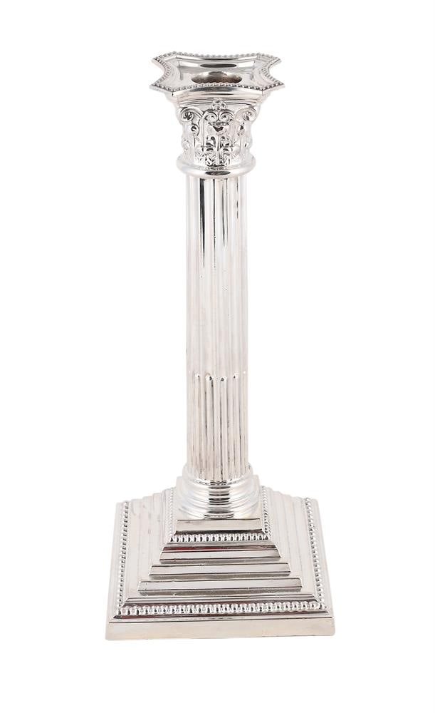 A SILVER CORINTHIAN CANDLESTICK: A SILVER CORINTHIAN CANDLESTICK