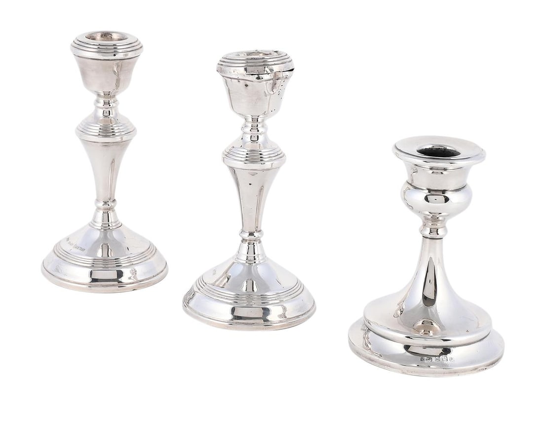 A PAIR OF SILVER CANDLESTICKS: A PAIR OF SILVER CANDLESTICKS W. I. BRO