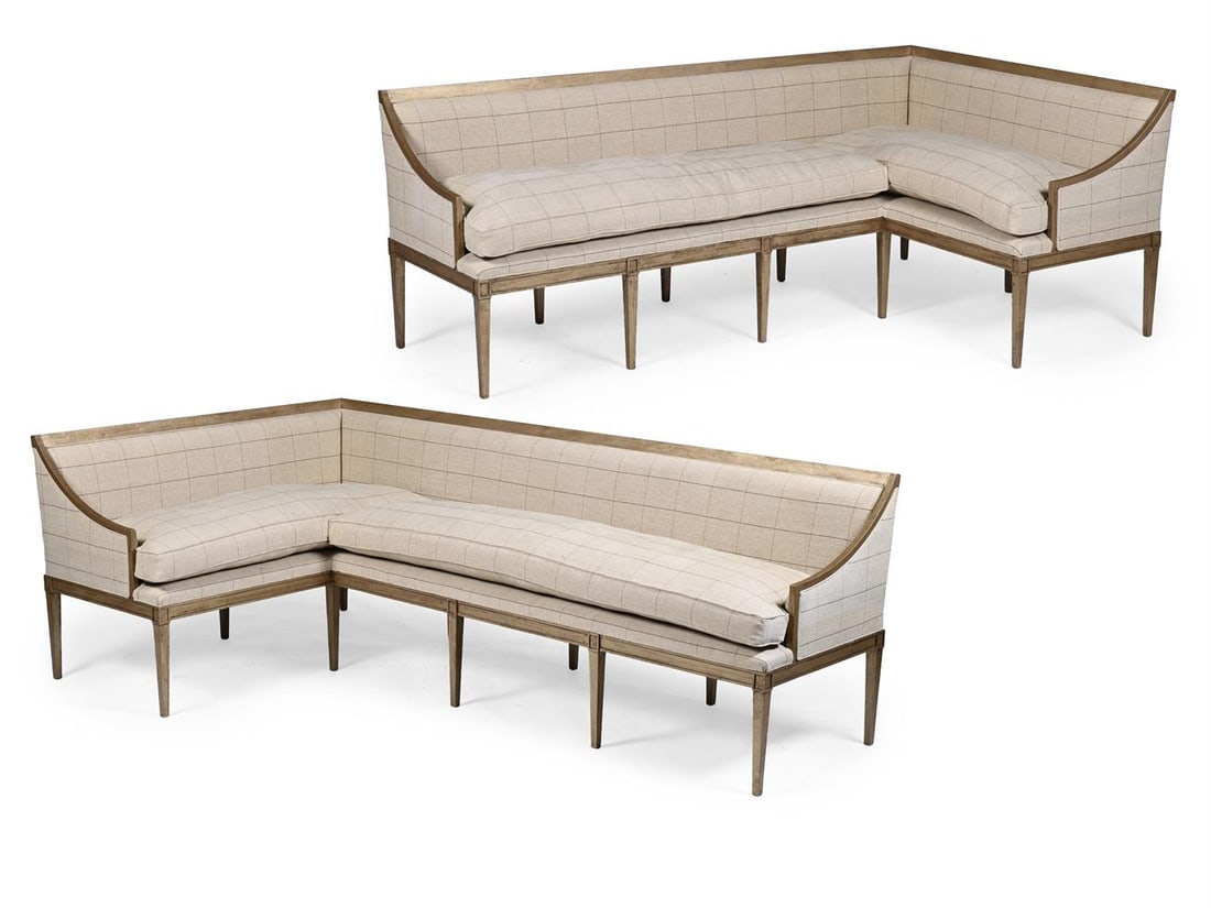 A MATCHED PAIR OF SILVERED WOOD AND UPHOLSTERED CORNER SETTEES, OF RECENT MANUFACTURE: A MATCHED PAIR OF SILVERED WOOD AND UPHOLSTERED CORNER SETTEES