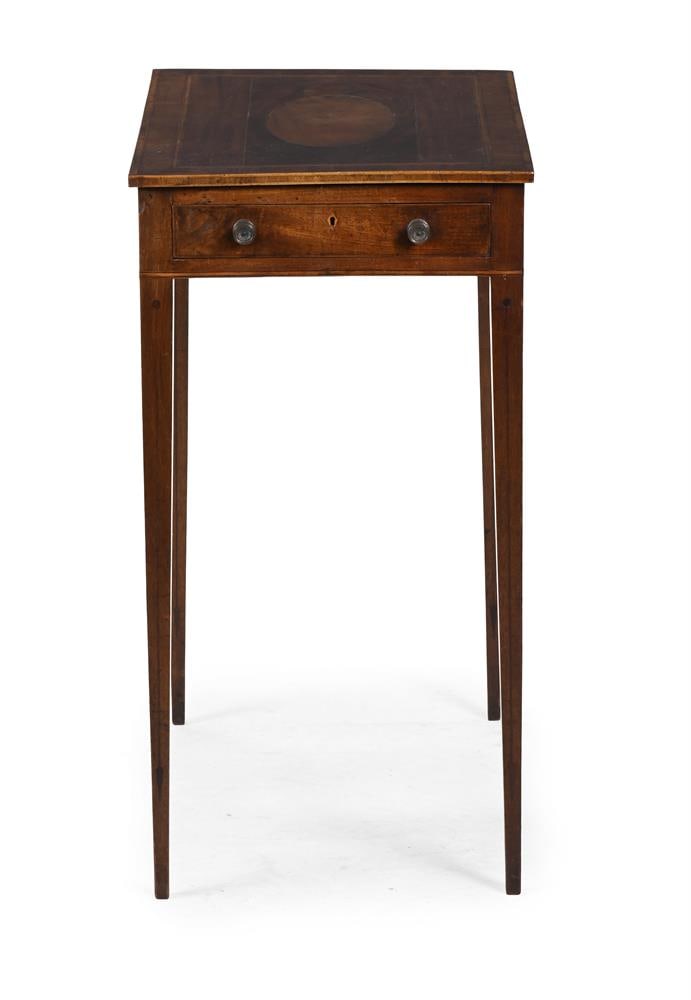 A GEORGE III MAHOGANY READING-TABLE, CIRCA 1800 (1 of 3)