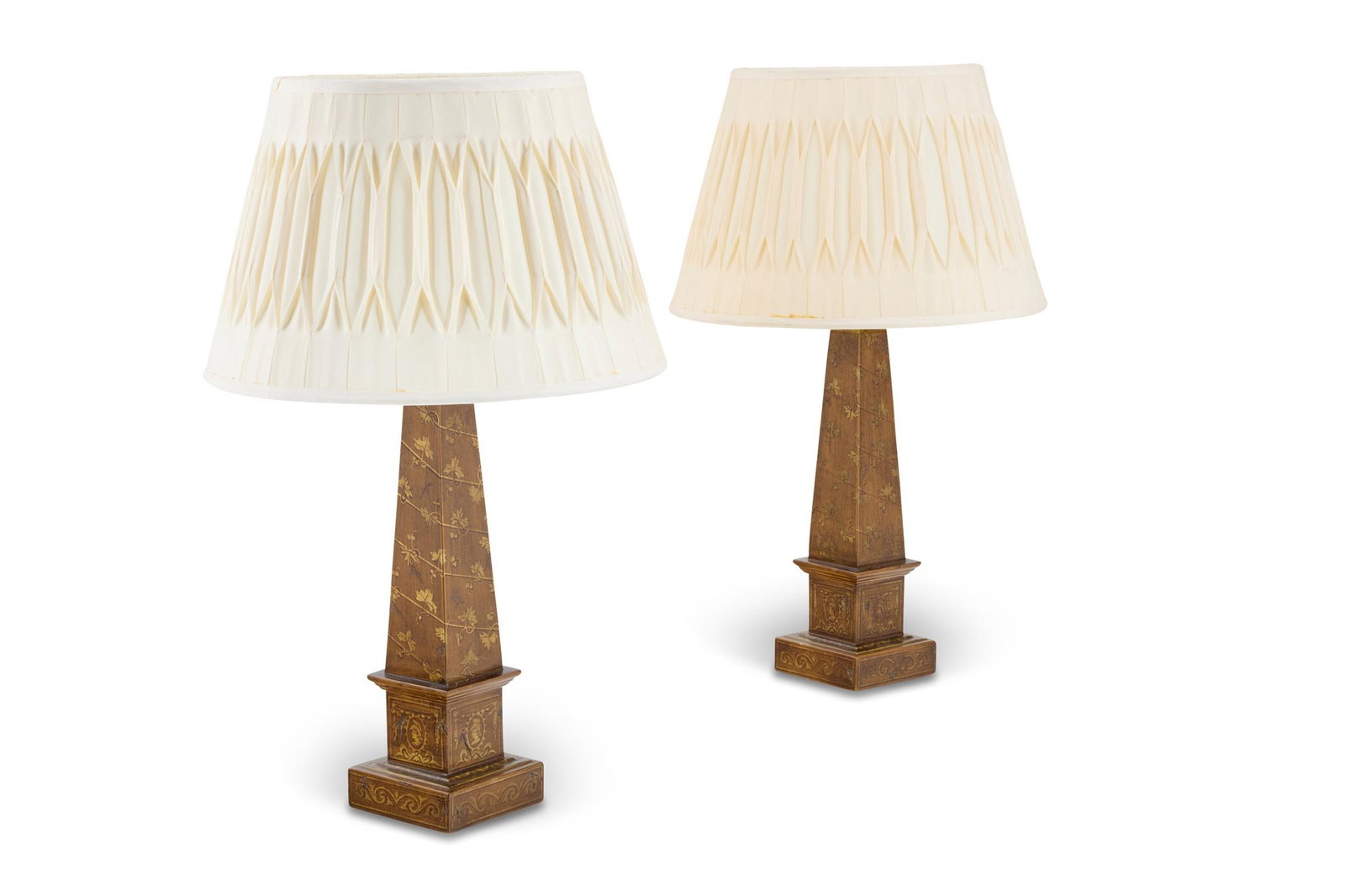 A PAIR OF GILT FLORAL PAINTED WOOD TABLE LAMPS ROCHAMP, MODERN: A PAIR OF GILT FLORAL PAINTED WOOD TABLE LAMPS ROCHAMP, MODERN Of obelisk form, fitted for electricity and mounted as lamps, maker labels to undersides Bases including fitments 50.5cm high, overall in