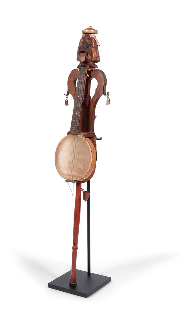 A STREET ENTERTAINER'S COMPOSITE MUSICAL INSTRUMENT, PROBABLY EASTERN EUROPE (1 of 2)