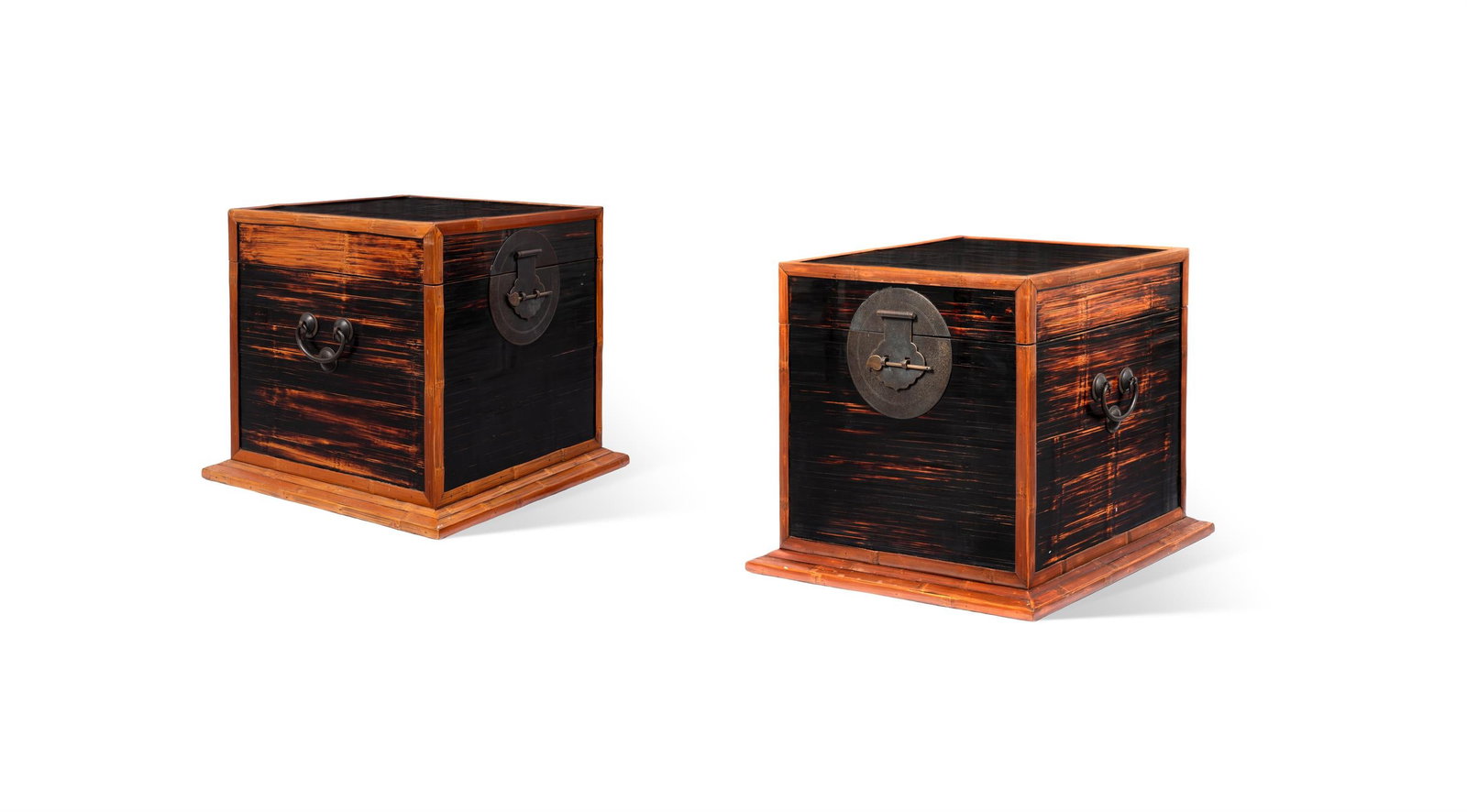 A PAIR OF CHINESE BAMBOO AND BLACK BAMBOO LIDDED BOXES, MODERN: A PAIR OF CHINESE BAMBOO AND BLACK BAMBOO LIDDED BOXESMODERN Each with brass handles to the side and decorative lock plates on a moulded plinth 51cm high, 54cm square