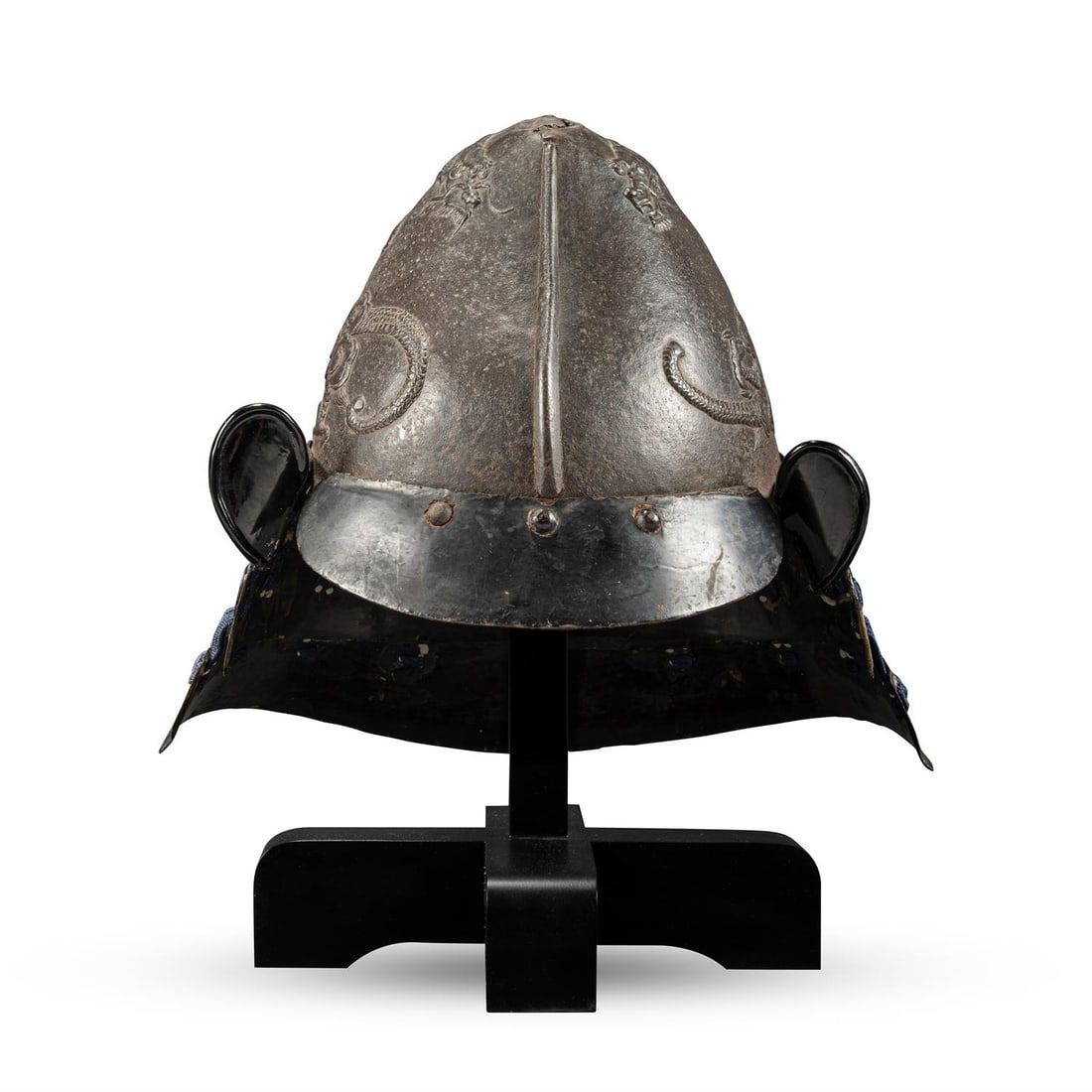 ‡ An iron momonari kabuto [peach-shaped helmet], Momoyama-Edo period: ‡ Property from the Collection of Jean SaportaAn iron momonari kabuto [peach-shaped helmet]Momoyama - Edo period, late 16th - early 17th century the two-plate russet iron bowl with raised ridge