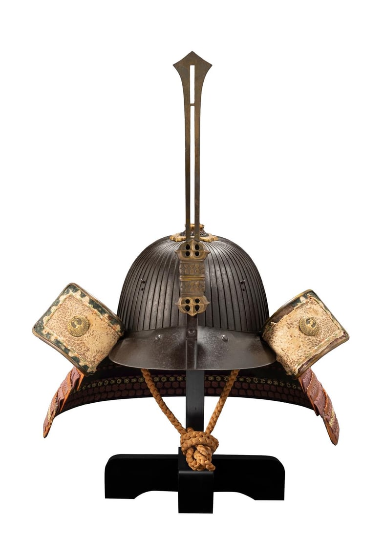 ‡ A Myochin suji-bachi [helmet with raised ridges], Muromachi period: ‡ The Property of a Gentleman A Myochin suji-bachi [helmet with raised ridges]Signed Myochin Nobuie and kao [cursive monogram]Muromachi period, dated Tenbun yonen kinoto hitsuji nigatsu kichijitsu (
