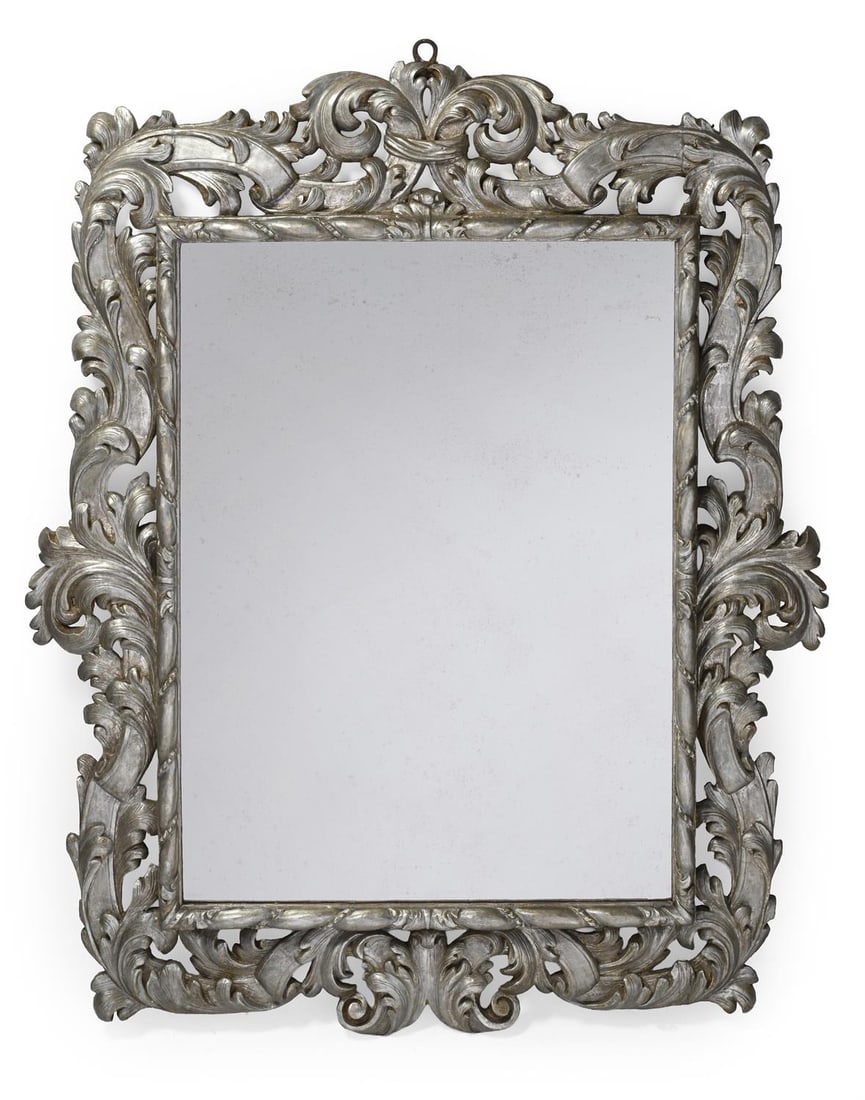 A LARGE ITALIAN SILVERED WOOD AND FOLIATE CARVED MIRROR, MID 18TH CENTURY (1 of 3)