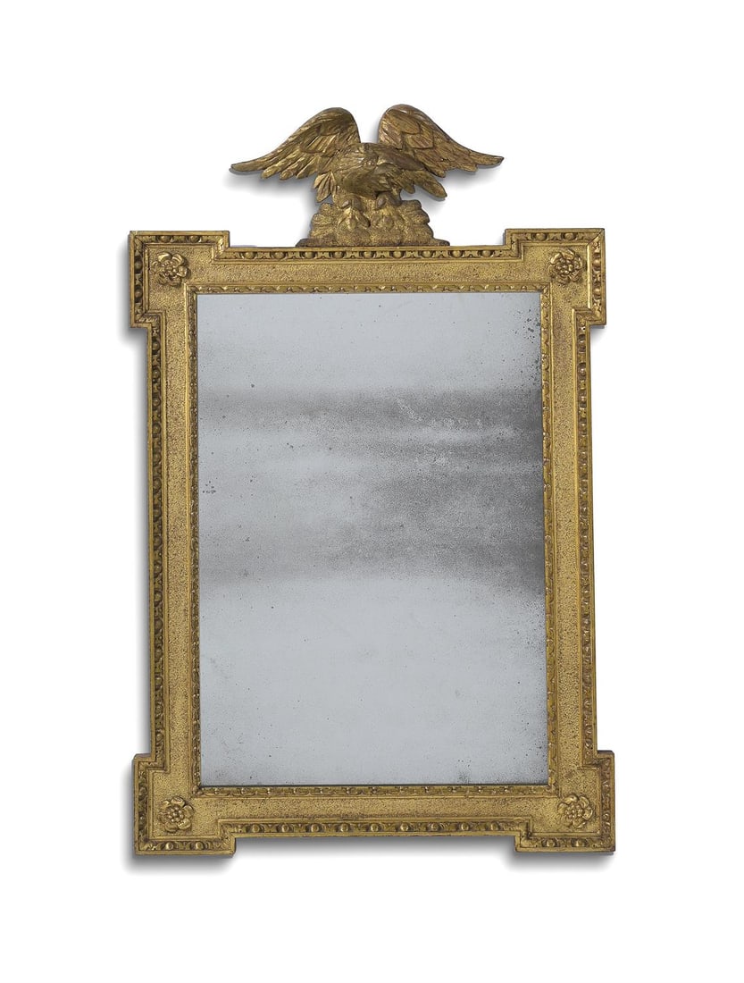 A GEORGE II CARVED GILTWOOD MIRROR, IN THE MANNER OF WILLIAM KENT, CIRCA 1740 (1 of 5)