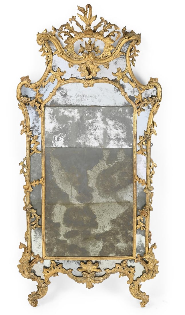 A LARGE CONTINENTAL CARVED GILTWOOD MIRROR, FIRST HALF 18TH CENTURY (1 of 3)
