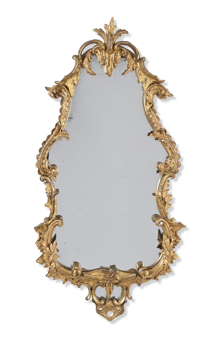 A GEORGE III CARVED GILTWOOD MIRROR, CIRCA 1765 (1 of 2)