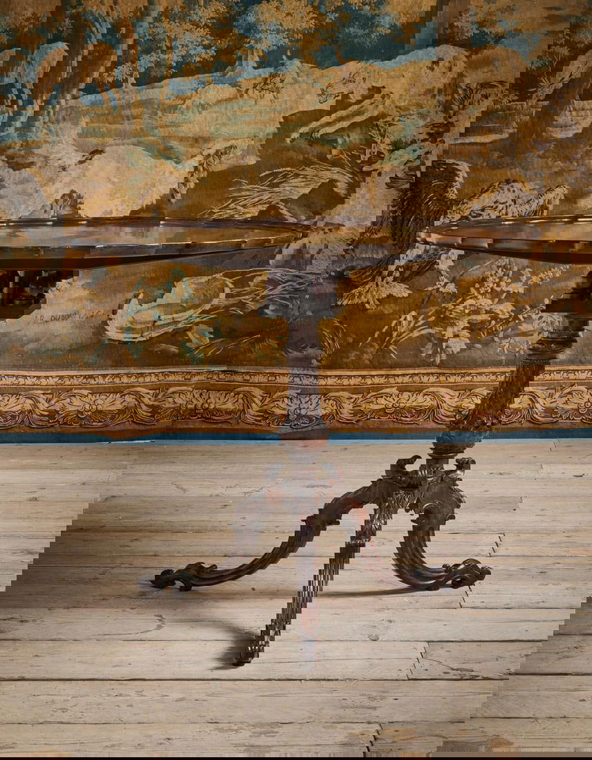 A GEORGE III MAHOGANY 'BIRD CAGE' TRIPOD TABLE POSSIBLY AMERICAN, CIRCA 1770: A GEORGE III MAHOGANY 'BIRD CAGE' TRIPOD TABLE POSSIBLY AMERICAN, CIRCA 1770The 'pie crust' top above a finely acanthus carved and scale carved stem, on hipped downswept legs terminating in scroll and