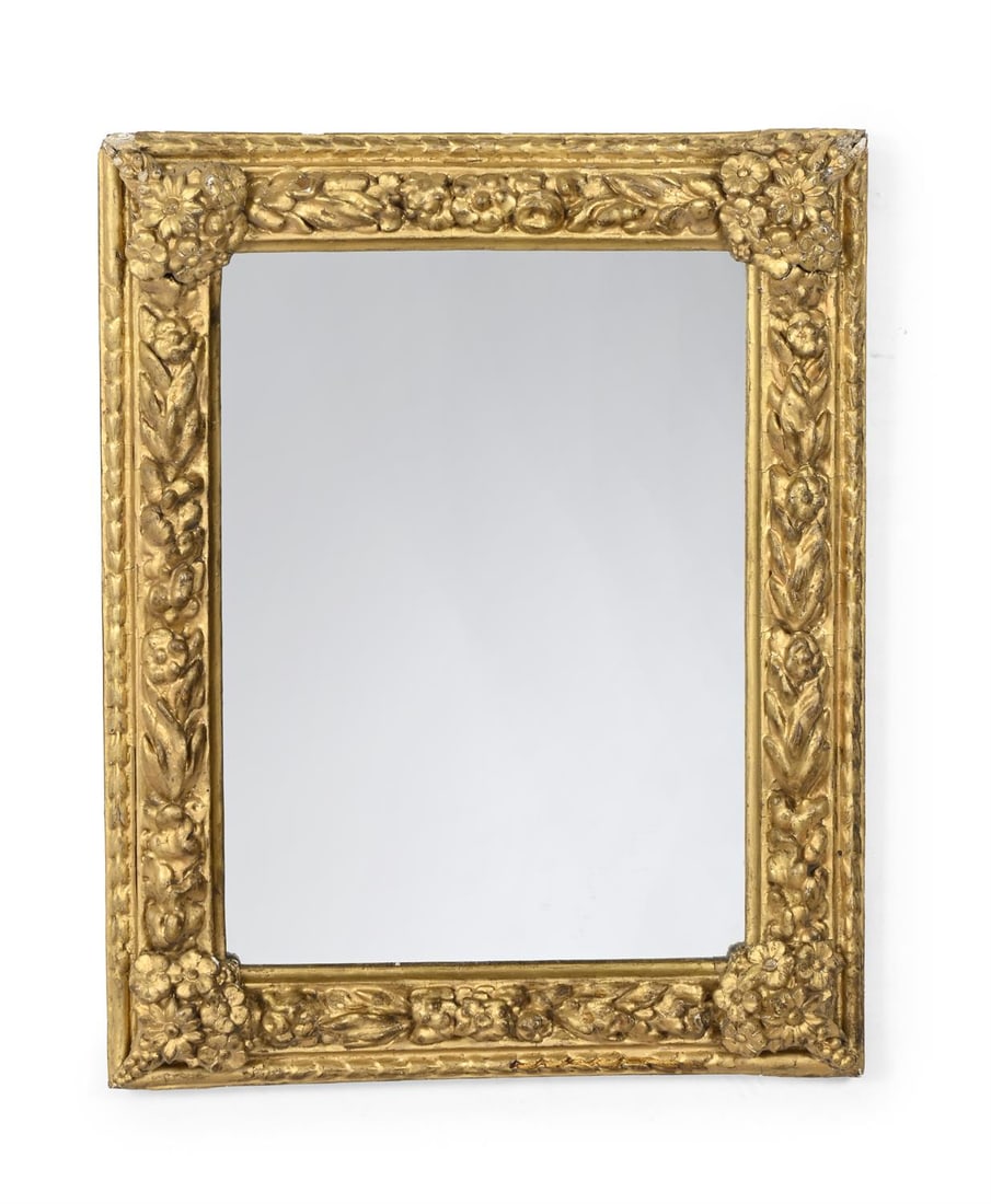 A CHARLES II CARVED GILTWOOD MIRROR, CIRCA 1670 (1 of 2)