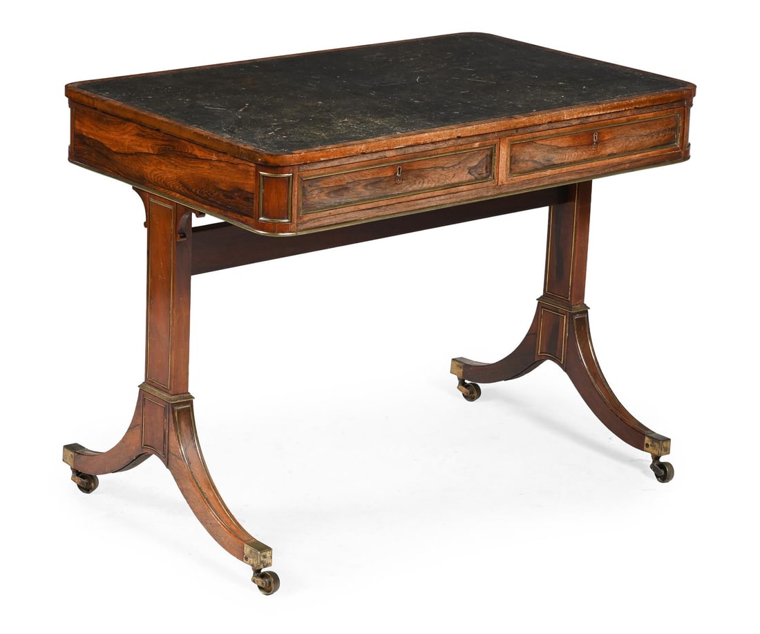 Y A REGENCY ROSEWOOD AND GILT BRASS MOUNTED LIBRARY TABLE, IN THE MANNER OF GILLOWS, CIRCA 1815 (1 of 3)