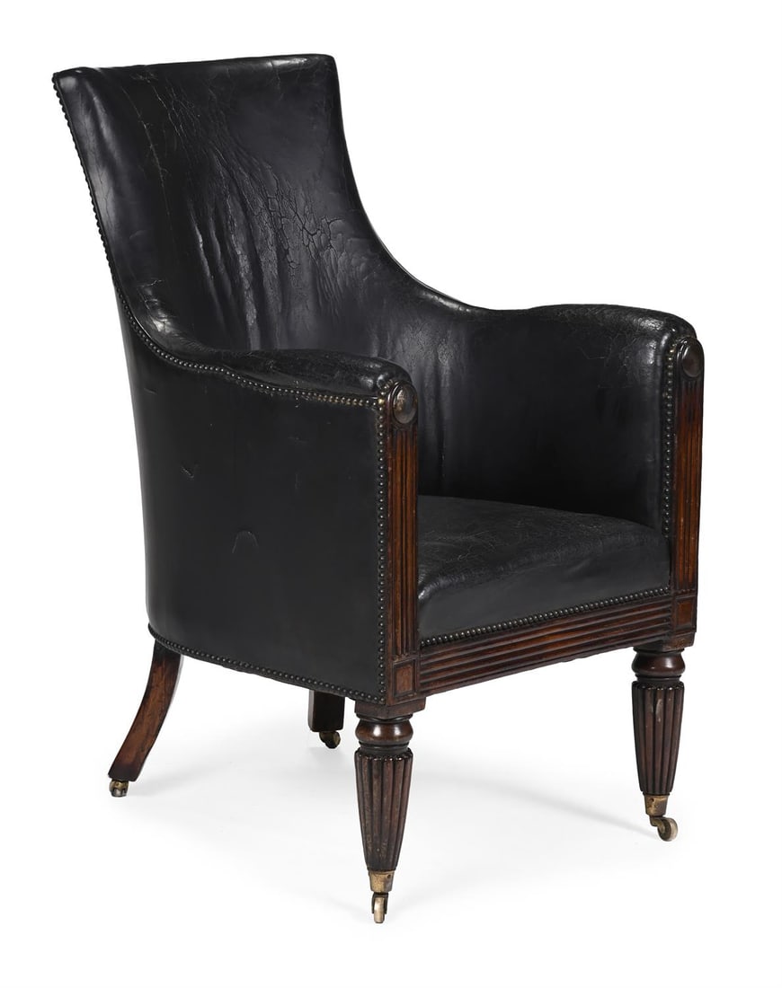 A REGENCY MAHOGANY AND STUDDED LEATHER UPHOLSTERED LIBRARY ARMCHAIR, CIRCA 1820 (1 of 3)