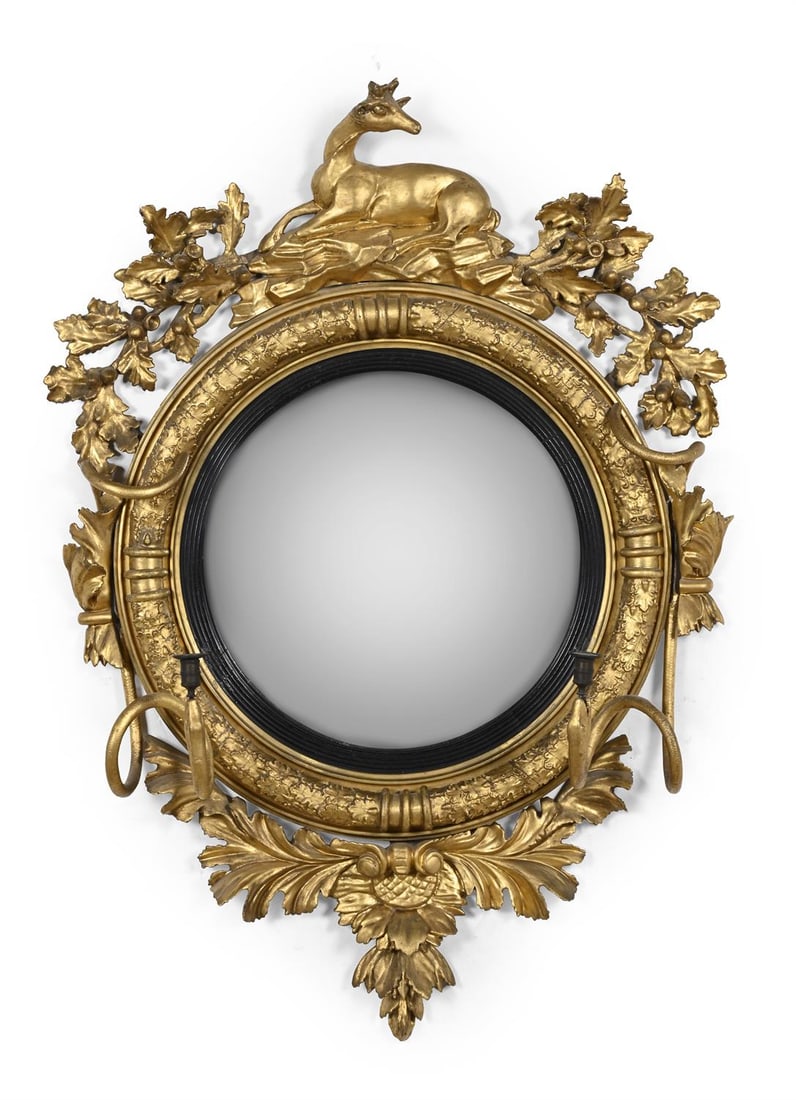A REGENCY CARVED GILTWOOD CONVEX WALL MIRROR, CIRCA 1815 (1 of 5)