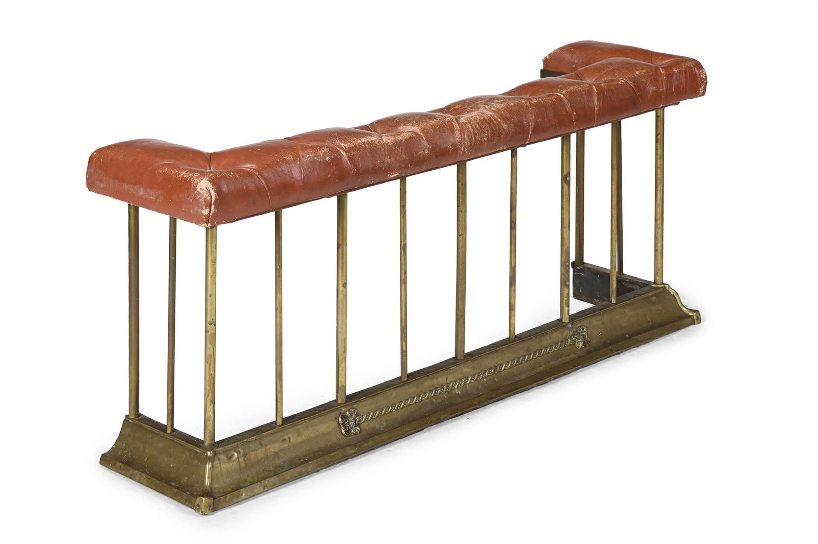 A VICTORIAN RED LEATHER AND BRASS CLUB FENDER, LATE 19TH OR EARLY 20TH CENTURY (1 of 2)