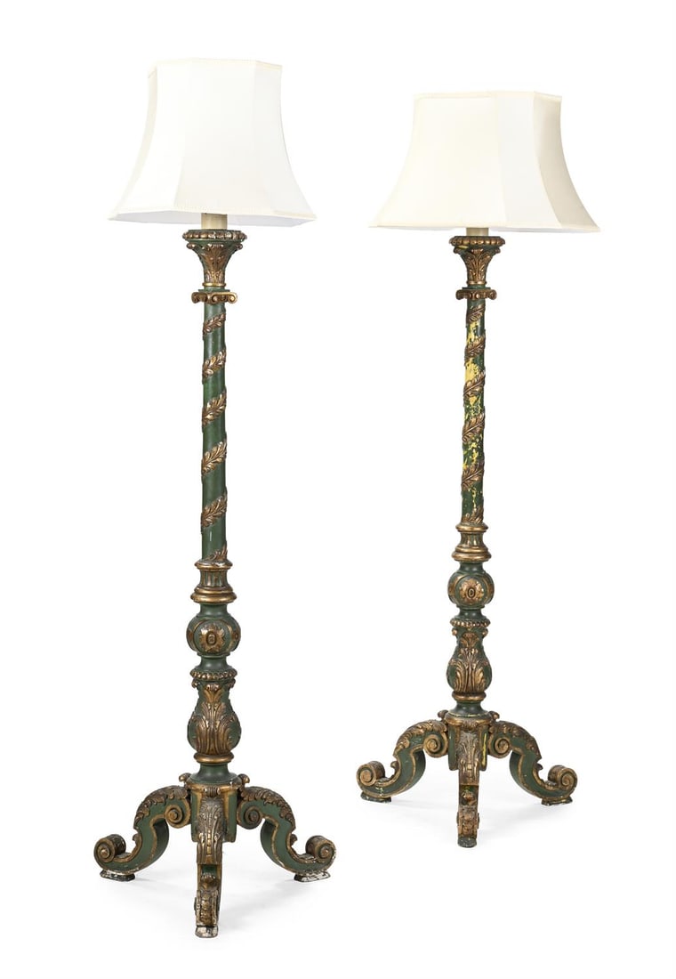 A PAIR OF GREEN PAINTED AND PARCEL GILT STANDARD LAMPS, IN VENETIAN STYLE: A PAIR OF GREEN PAINTED AND PARCEL GILT STANDARD LAMPSIN VENETIAN STYLE, FIRST HALF 20TH CENTURY 194cm high overall including shadesProvenance: From the estate of Mervyn Horatio Herbert, 17th Baron Da