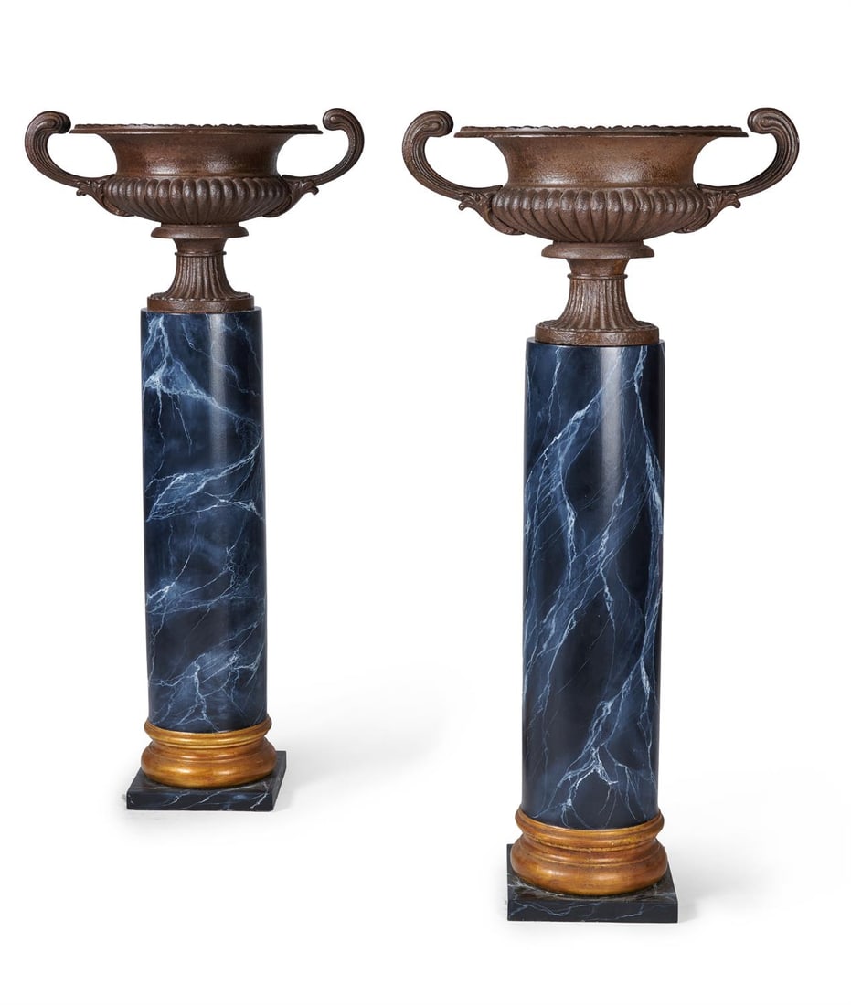A PAIR OF CAST IRON TWIN HANDLED URNS ON COLUMN BASES, 19TH CENTURY (1 of 3)
