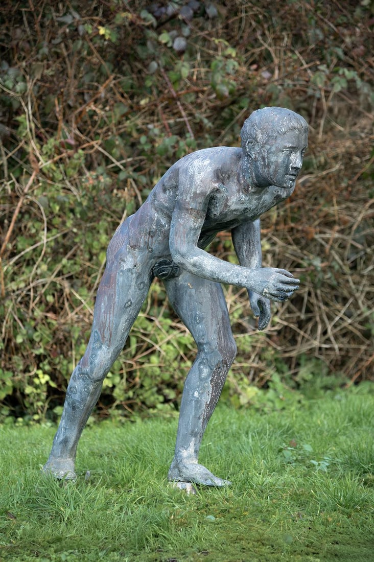 AFTER THE ANTIQUE, A LARGE LEAD FIGURE OF THE YOUNG ATHLETE RUNNER, LATE 20TH CENTURY (1 of 3)