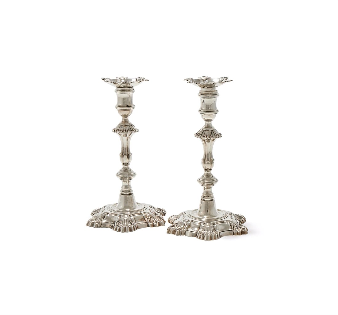 A PAIR OF GEORGE II SILVER CAST CANDLESTICKS (1 of 2)