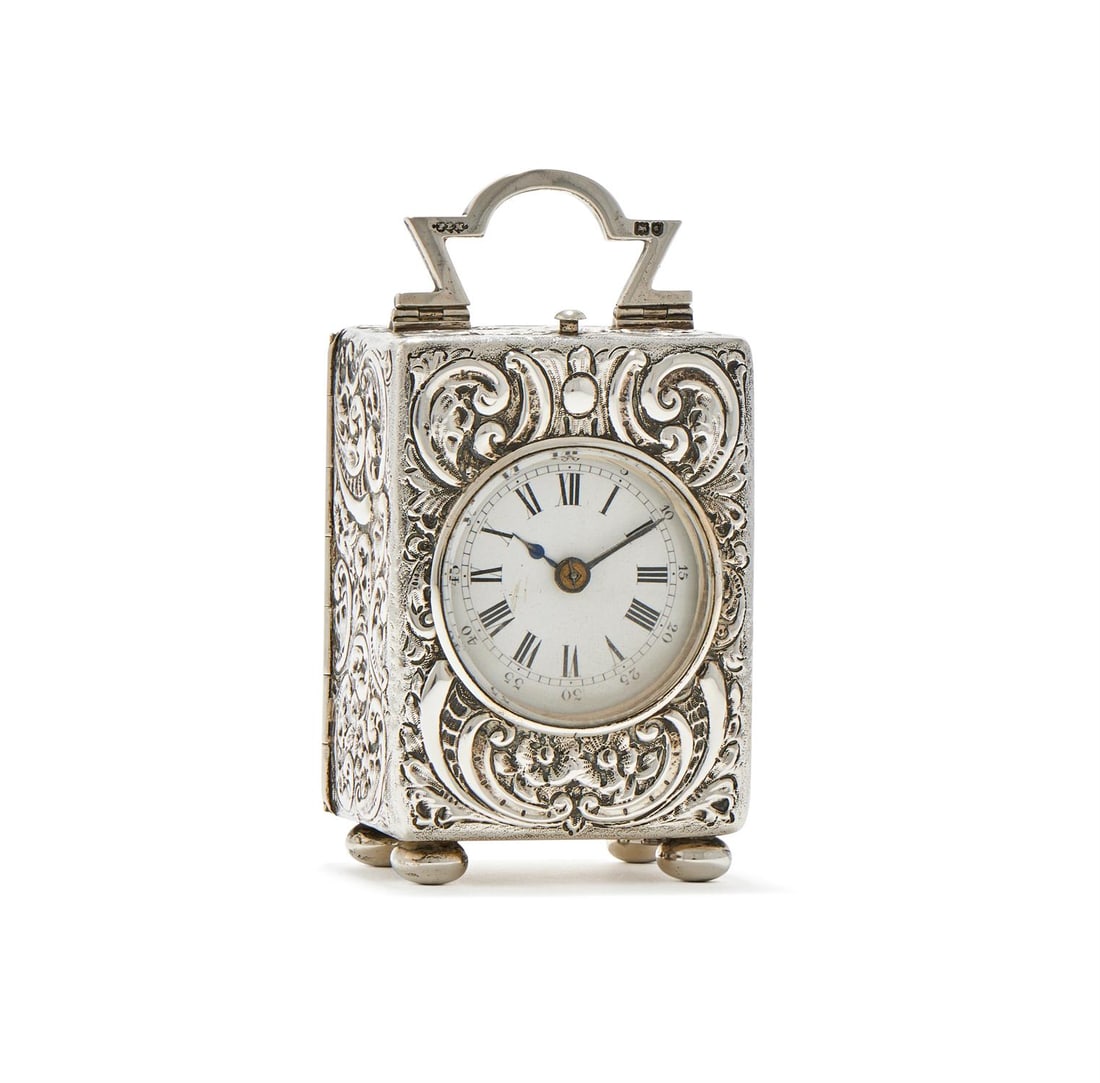 A VICTORIAN SILVER CASED TRAVELLING TIMEPIECE (1 of 2)