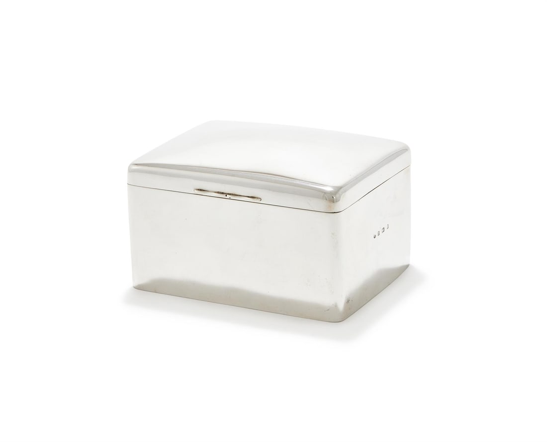 AN EDWARDIAN RECTANGULAR SILVER TABLE BOX: AN EDWARDIAN RECTANGULAR SILVER TABLE BOXMAKER'S MARK ... OVER J Z, BIRMINGHAM 1903With a cedar liner16cm longTogether with:A rectangular silver table boxJames Woods & Sons, Birmingham 1914Engraved wi