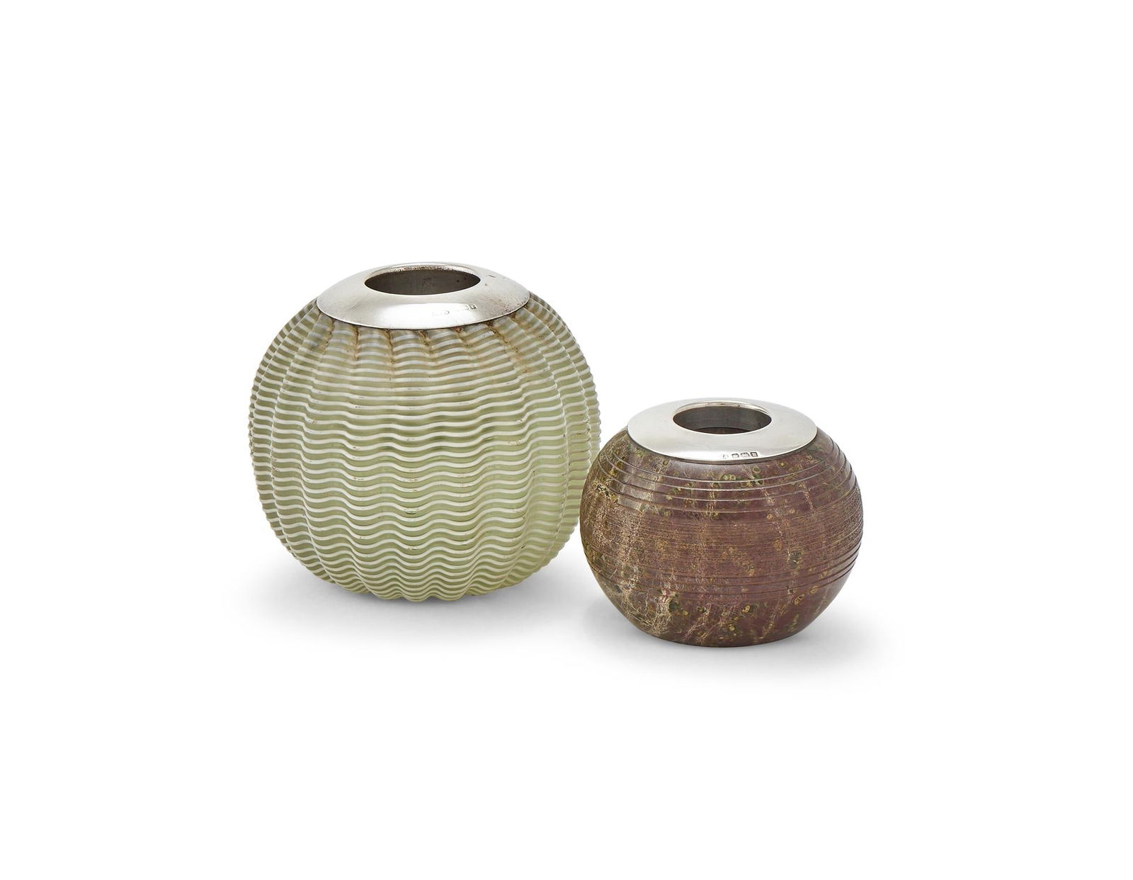 AN EDWARDIAN SILVER MOUNTED MATCH HOLDER/STRIKER: AN EDWARDIAN SILVER MOUNTED MATCH HOLDER/STRIKERJOHN GRINSELL & SONS, BIRMINGHAM 190510cm diameterTogether with:A silver mounted and granite match holderAtkin Brothers, Sheffield 19168cm