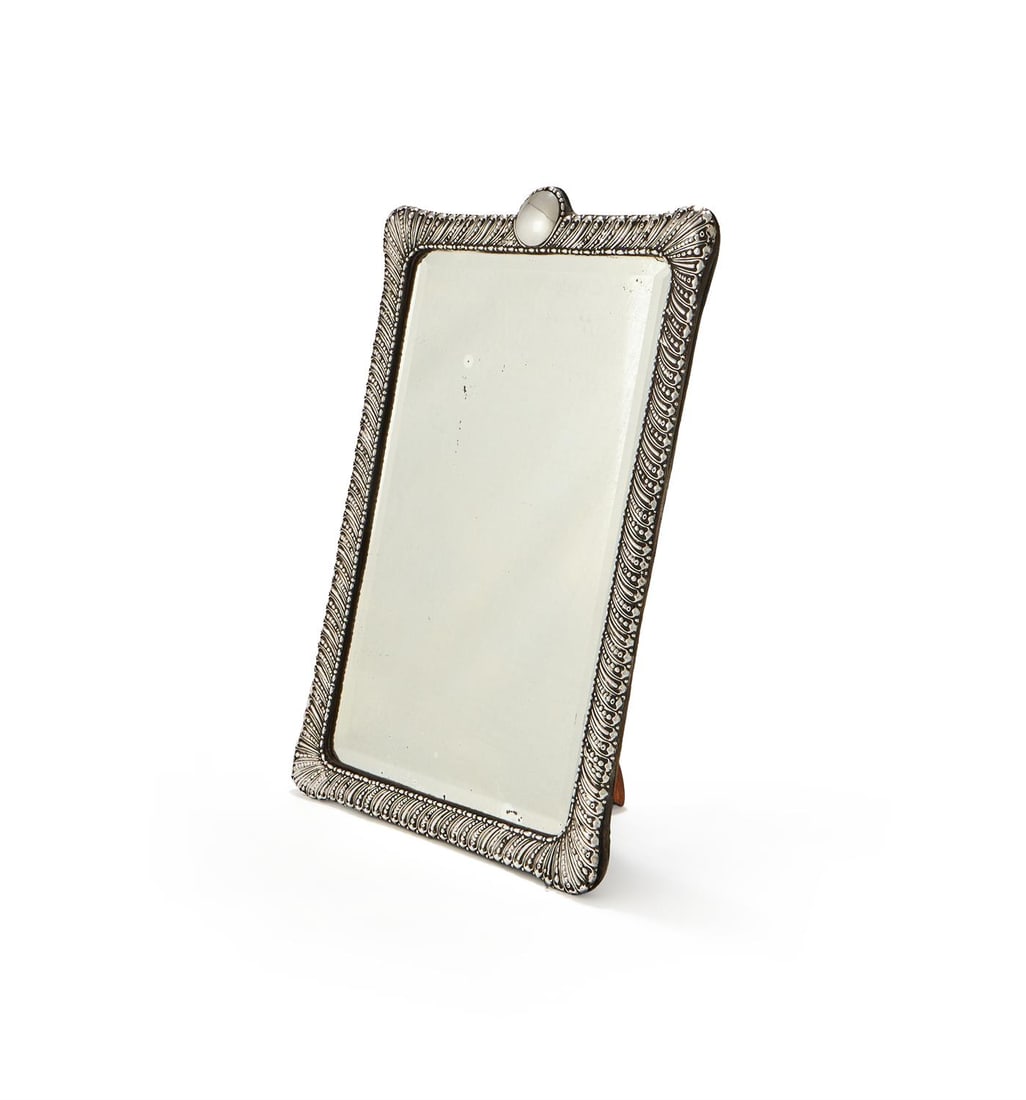 A VICTORIAN SILVER MOUNTED DRESSING TABLE MIRROR (1 of 2)