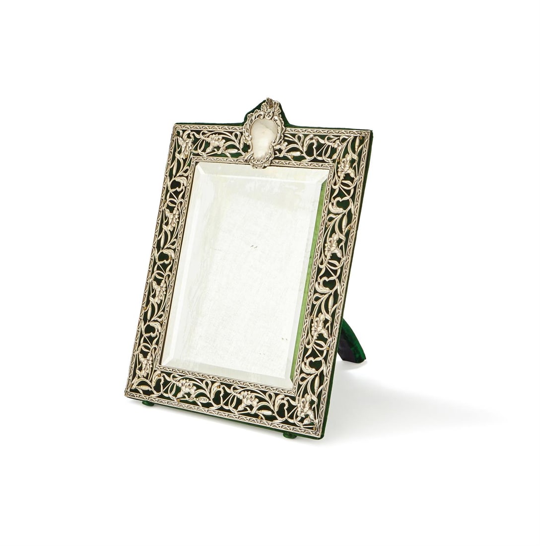 AN EDWARDIAN SILVER MOUNTED EASEL BACKED MIRROR (1 of 2)