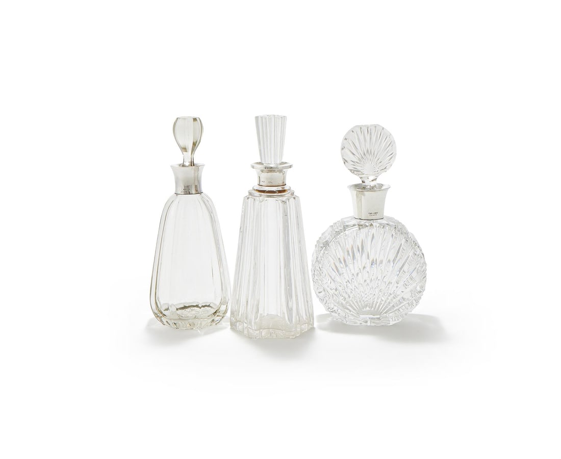 A SILVER MOUNTED GLASS DECANTER (1 of 2)